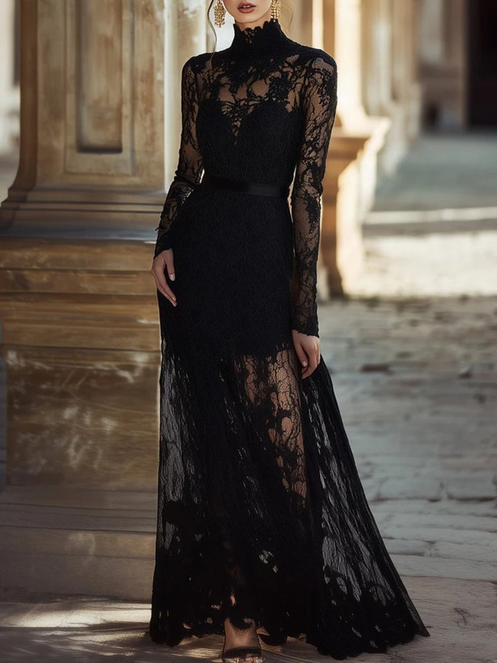 Black lace dress worn by a model in an elegant outdoor setting